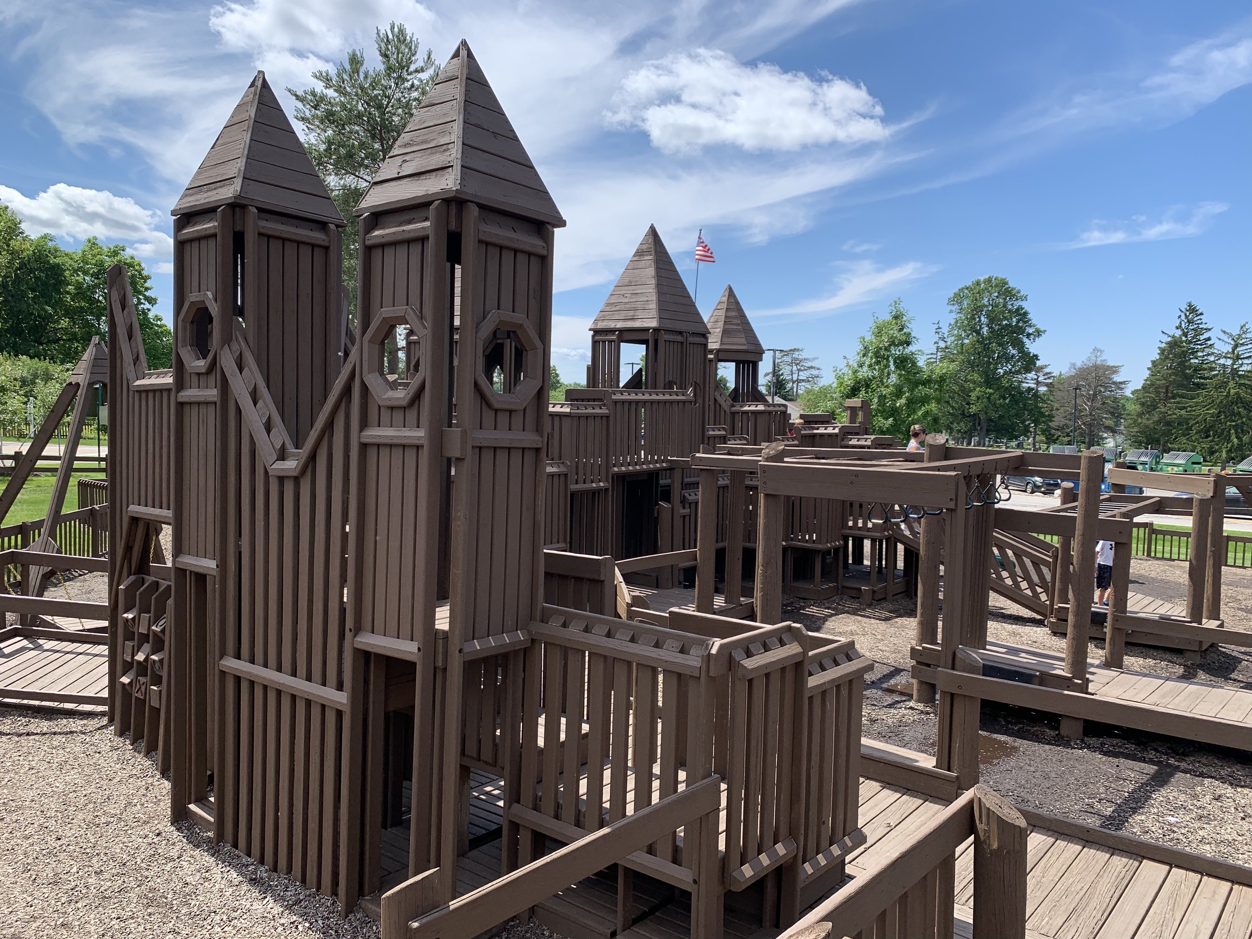 a park made of wood in the shape of a castle and northeast ohio park in strongsville
