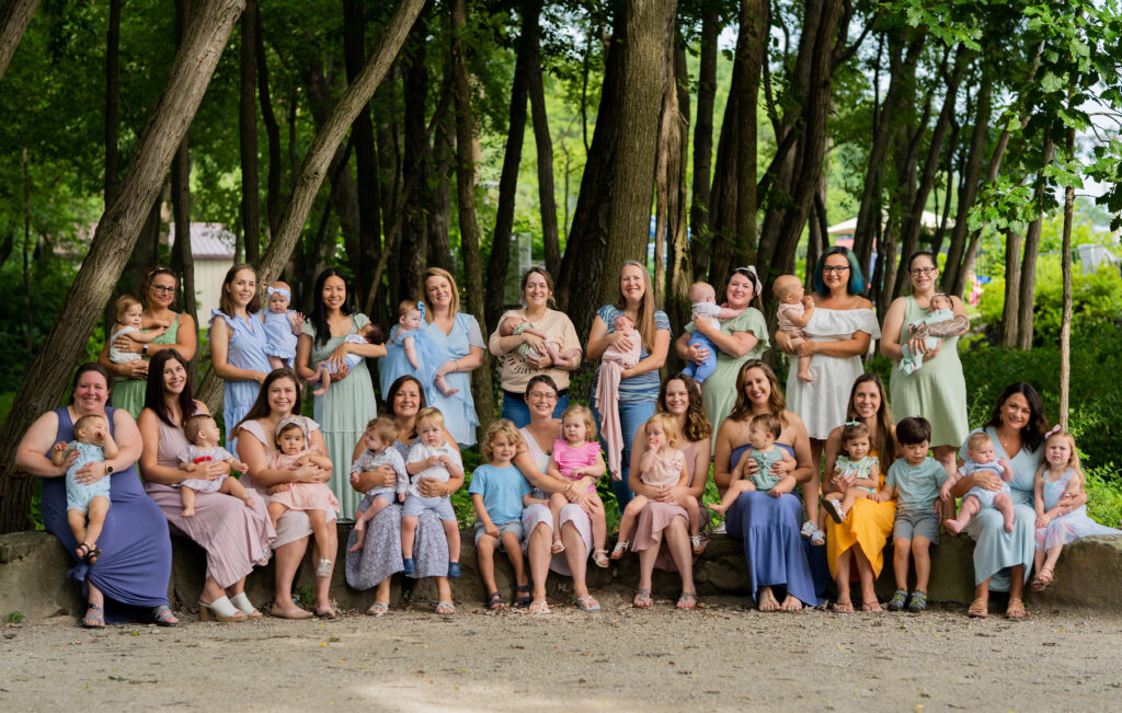 a group of breastfeeding mothers for the annual breastfeeding event in cleveland ohio hosted by christella photography 